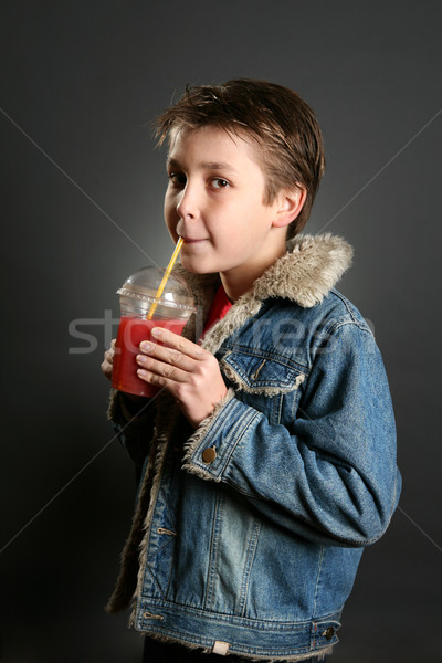 Boy Sipping a Tasty Berry Juice Stock photo © lovleah