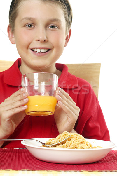 Fiú üveg narancslé boldog mosolyog gyermek Stock fotó © lovleah