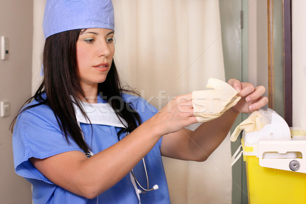 Medizinischen Arbeitnehmer weiblichen Arzt Chirurg Abfälle Stock foto © lovleah