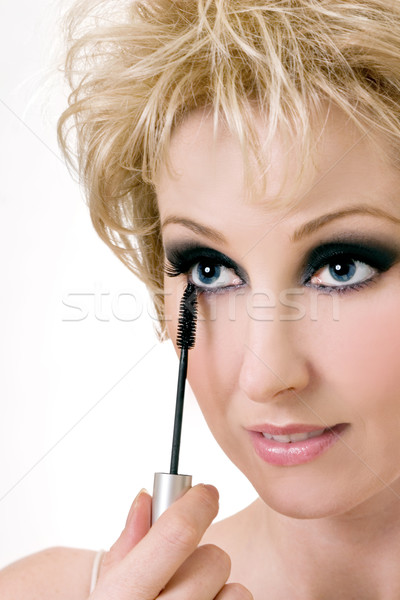 [[stock_photo]]: Femme · mascara · baisser · belle