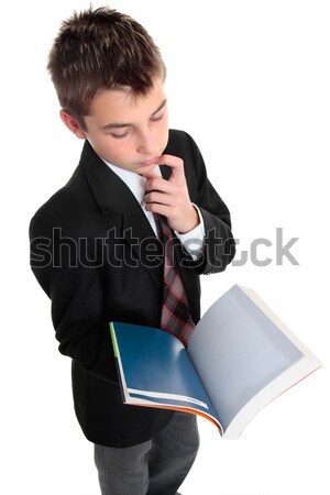 Student pindering thinking with open text book Stock photo © lovleah