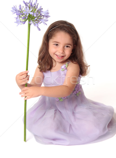 Pretty girl holding flower Stock photo © lovleah