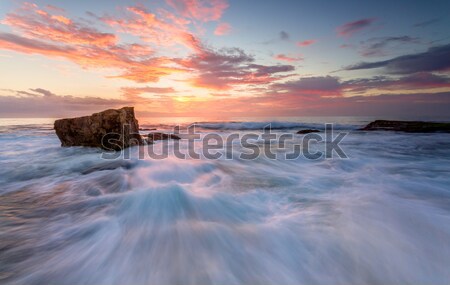 Sunrise north Turrimetta rockshelf flows Stock photo © lovleah