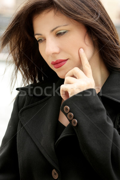 Beautiful business woman thinking Stock photo © lovleah