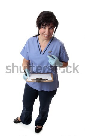 Nurse with medical chart Stock photo © lovleah