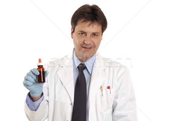 Doctor or vet with medication Stock photo © lovleah