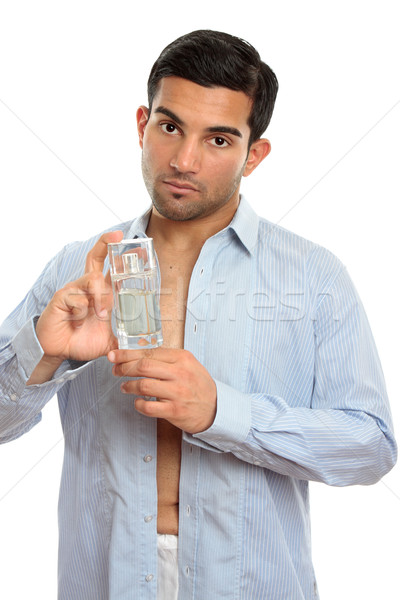 Man showing perfume cologne fragrance Stock photo © lovleah