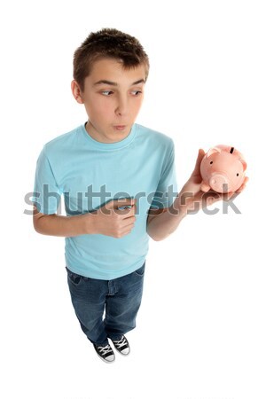 Boy looking at money box Stock photo © lovleah