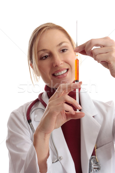 Doctor preparing needle Stock photo © lovleah