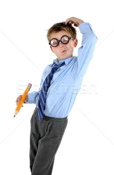 Stock photo: Child scratching his head for an answer