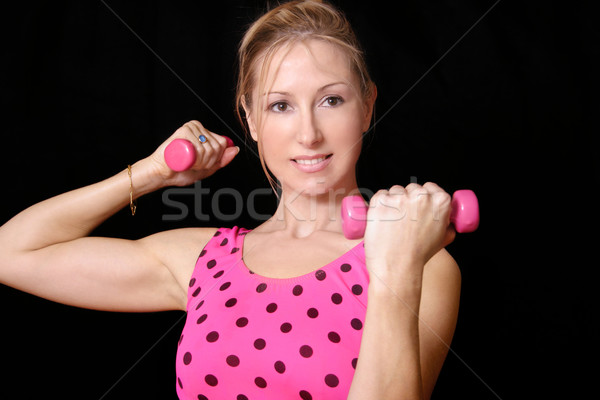 Firma femeie greutăţi femeie roz mână Imagine de stoc © lovleah