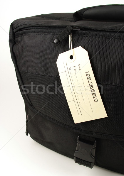 lost property tag and black bag Stock photo © luapvision