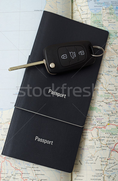 car key with passports and map Stock photo © luapvision