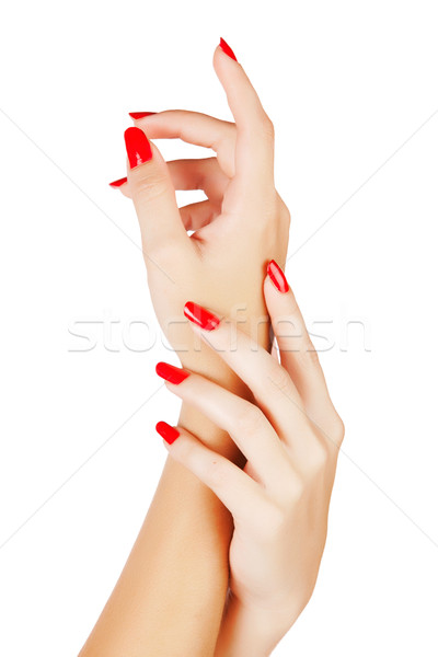Mujer manos uñas de color rojo primer plano largo Foto stock © lubavnel