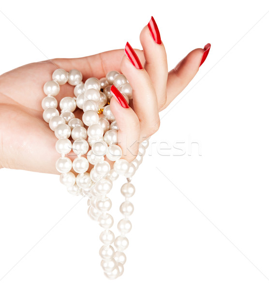 Kéz nő gyöngyök gyönyörű fiatal nő piros Stock fotó © lubavnel