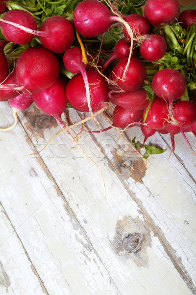 radish on grunge woden board Stock photo © lubavnel