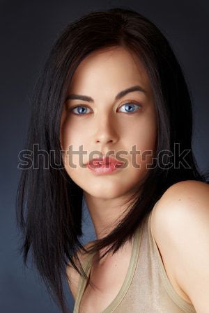 Nő sötét haj gyönyörű fiatal nő kék szemek arc Stock fotó © lubavnel