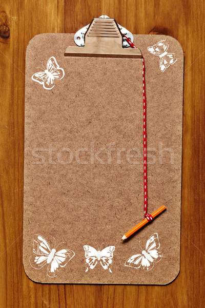 clipboard with butterflies Stock photo © lubavnel