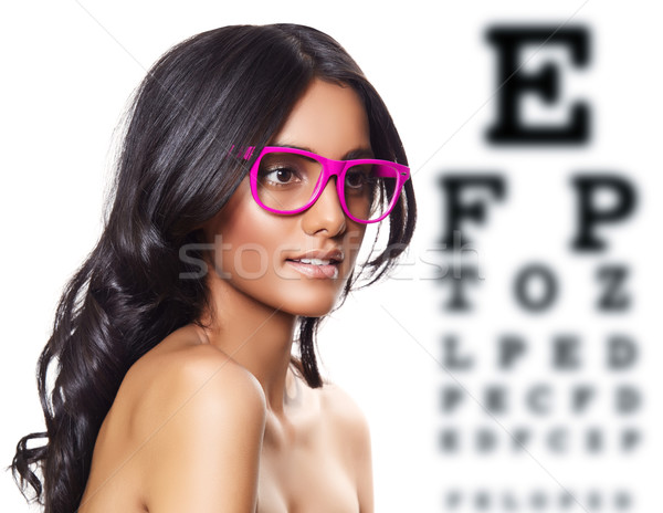 Stock photo: pink glasses on beautiful tanned woman.