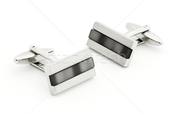 Pair of silver cuff links over white Stock photo © lucielang