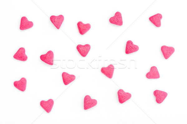 Pink candy hearts on white background Stock photo © lucielang