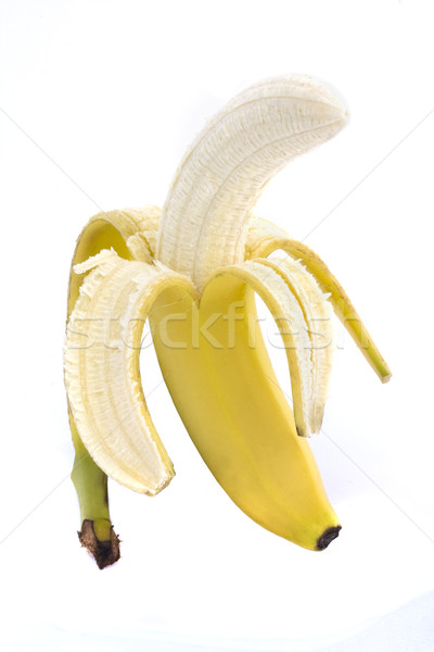 Half peeled banana over white Stock photo © lucielang