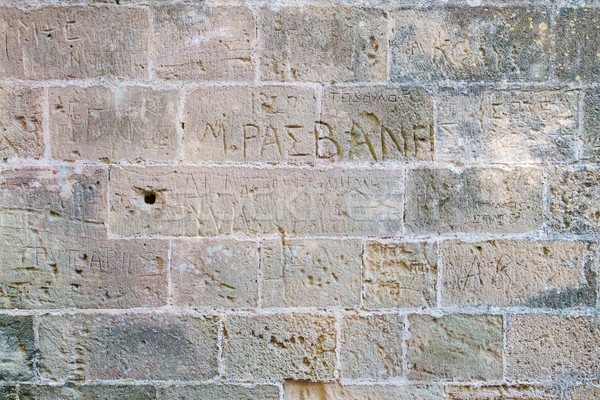 Alten Backsteinmauer Graffiti griechisch Textur Wand Stock foto © lucielang