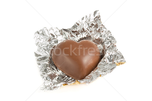 Heart shaped chocolate in a foil wrapper Stock photo © lucielang