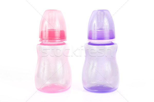 Two plastic baby bottles on white Stock photo © lucielang