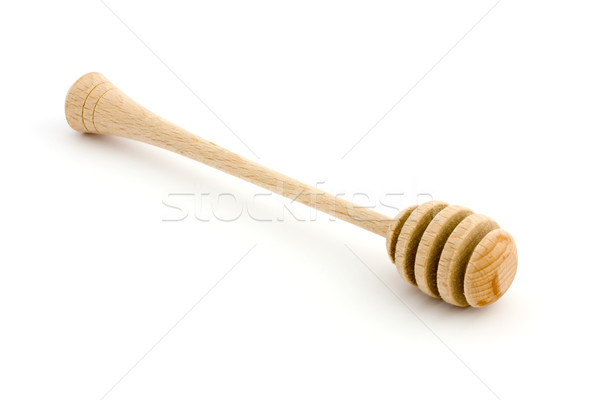 Wooden honey drizzler over white Stock photo © lucielang