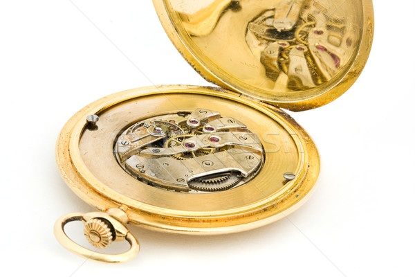 Inside of a gold pocket watch Stock photo © lucielang