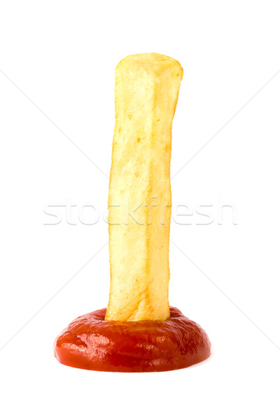 French fry being dipped in ketchup Stock photo © lucielang