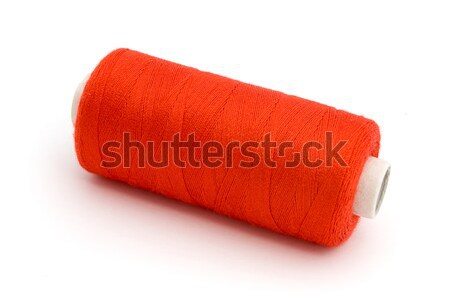 Red Cotton reel over white Stock photo © lucielang