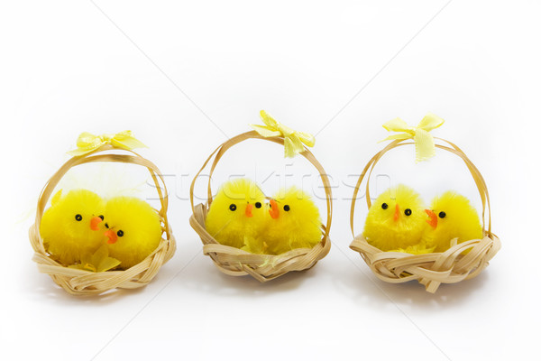 Three baskets of easter chicks over white Stock photo © lucielang
