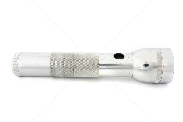 Silver flashlight over white Stock photo © lucielang