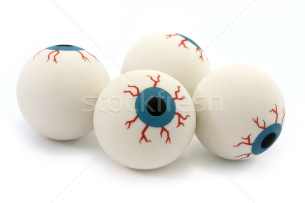 Four rubber toy eyeballs isolated on white Stock photo © lucielang
