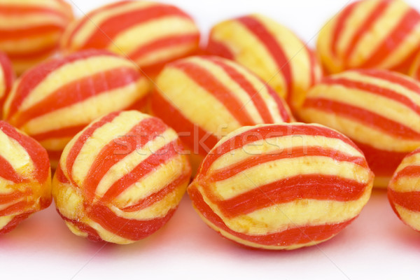 red and yellow hard bolied srtipy sweets. Stock photo © lucielang