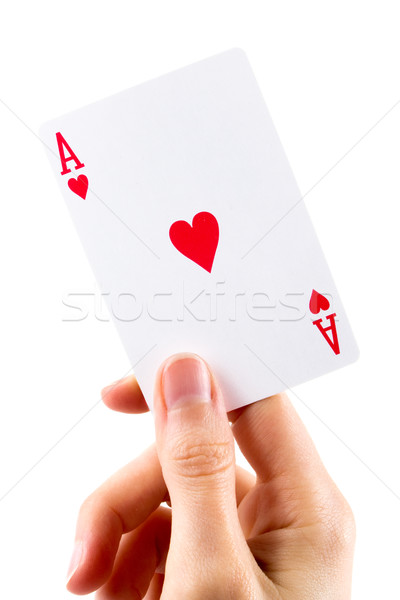 Ace of hearts being held over white Stock photo © lucielang