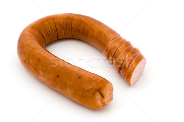 Sliced smoked sausage over white Stock photo © lucielang