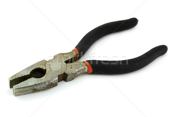 Pair of old rusty pliers over white. Stock photo © lucielang