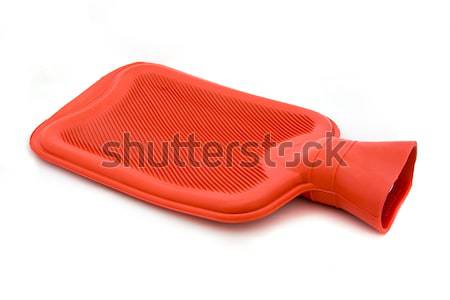 Red hot water bottle over white Stock photo © lucielang