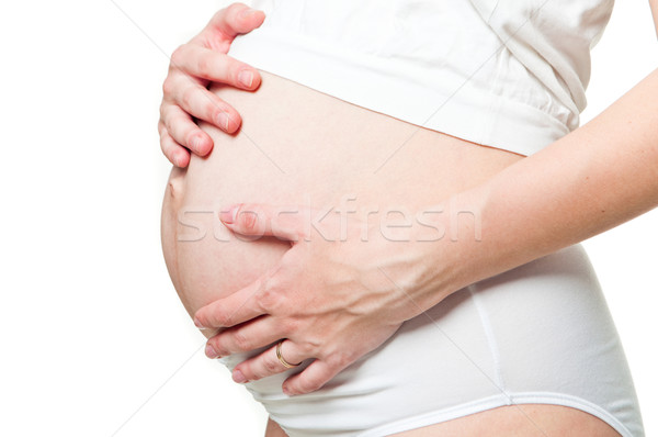 беременная женщина , держась за руки женщину ребенка Сток-фото © luckyraccoon