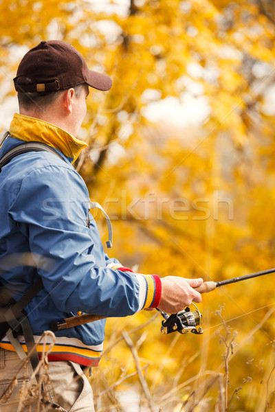 Pescatore autunno pesca stagione uomo sport Foto d'archivio © luckyraccoon