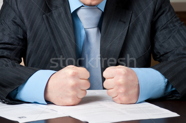 closeup of  businessman with clenched fists Stock photo © luckyraccoon