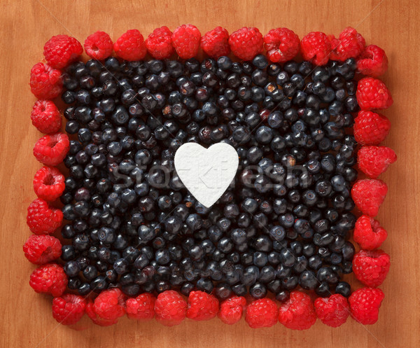 Colorful border frame made of berries Stock photo © luckyraccoon