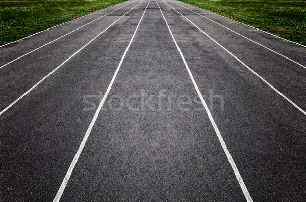 This is closeup of an Empty Running Track.  Stock photo © luckyraccoon