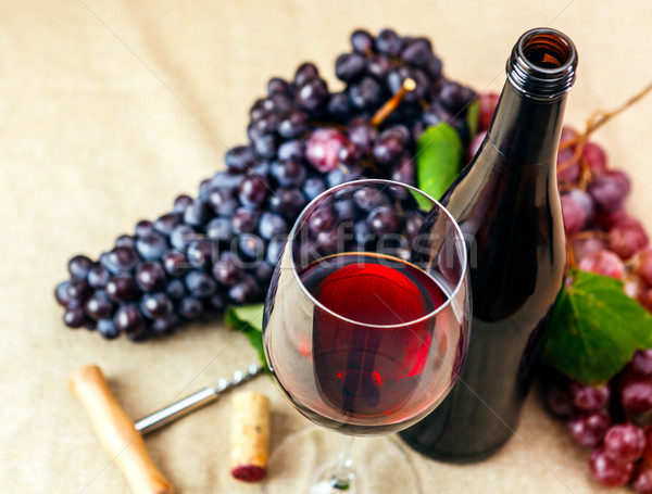 Stock photo: Bottle and glass of red wine