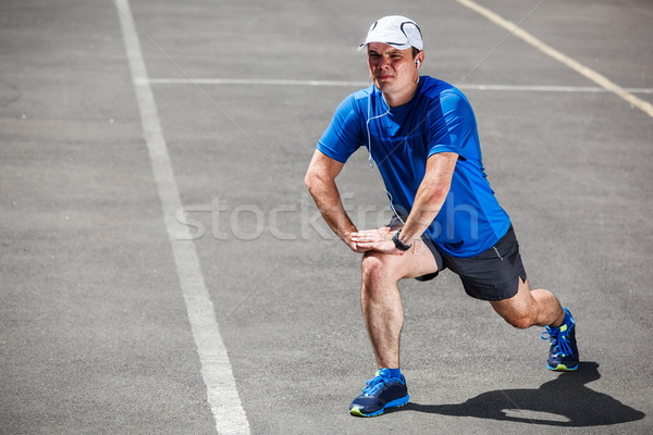 Männlich Läufer Dehnung Training Sport Körper Stock foto © luckyraccoon