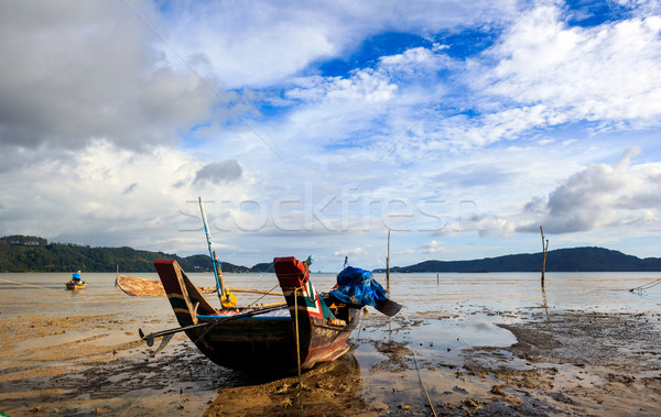 Thai longtail boats at low tide of the sea Stock photo © luckyraccoon