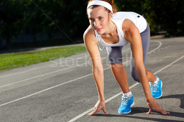 Woman getting ready to start on Stadium. Stock photo © luckyraccoon